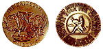 Two Copper Colored coins. One has a horse on it and the other has an outline of a person