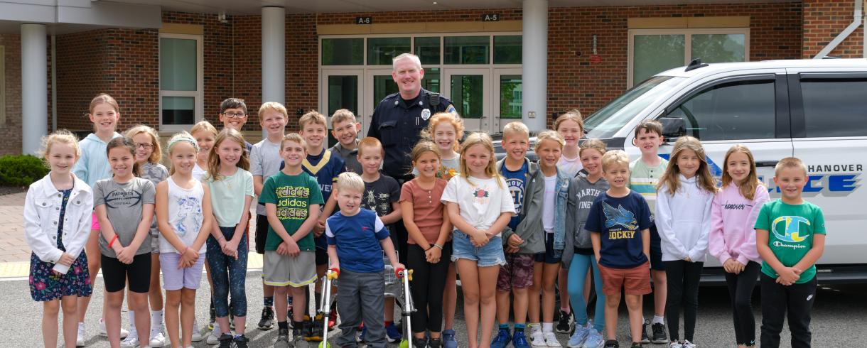 Officer John with Students at Center School